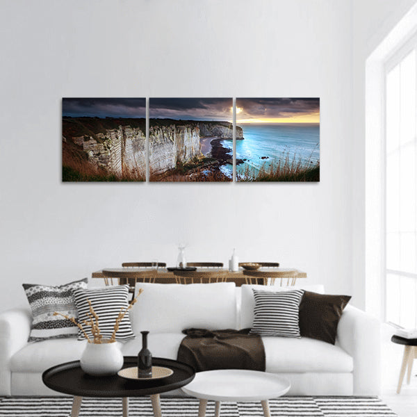 Sunshine and storm sky over cliffs in ocean, Etretat, France panoramic canvas wall art