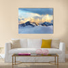 Alpine landscape with peaks covered by snow and clouds Multi panel canvas wall art