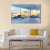 Alpine landscape with peaks covered by snow and clouds Multi panel canvas wall art