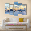 Alpine landscape with peaks covered by snow and clouds Multi panel canvas wall art