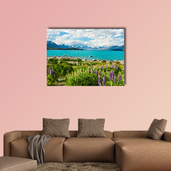 Beautiful incredibly blue Lake Tekapo with blooming lupins multi panel canvas wall art