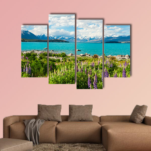 Beautiful incredibly blue Lake Tekapo with blooming lupins multi panel canvas wall art