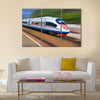 Beautiful photo of high speed modern commuter train Multi panel canvas wall art