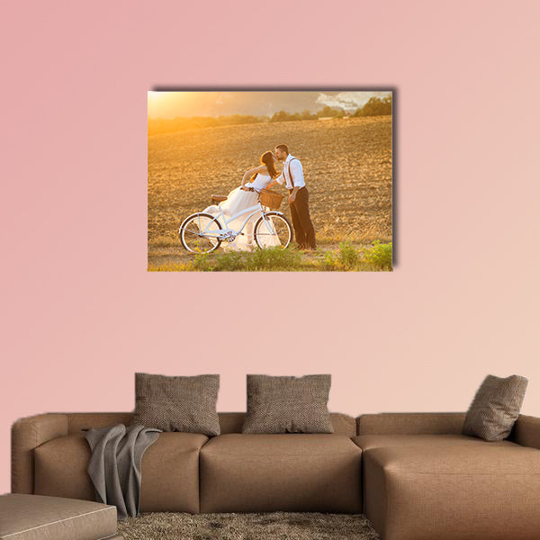 Beautiful bride and groom wedding portrait with white bike wall art