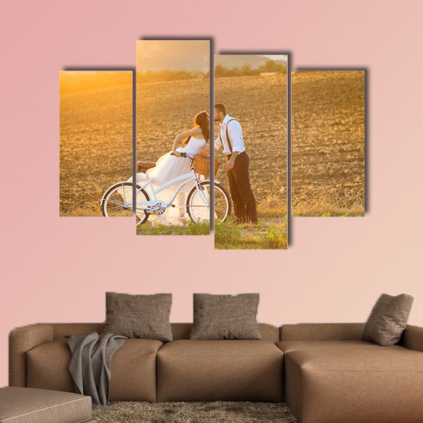 Beautiful bride and groom wedding portrait with white bike wall art