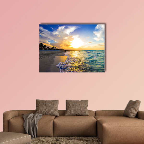 Sandy beach with the ocean at sunset Multi panel canvas wall art