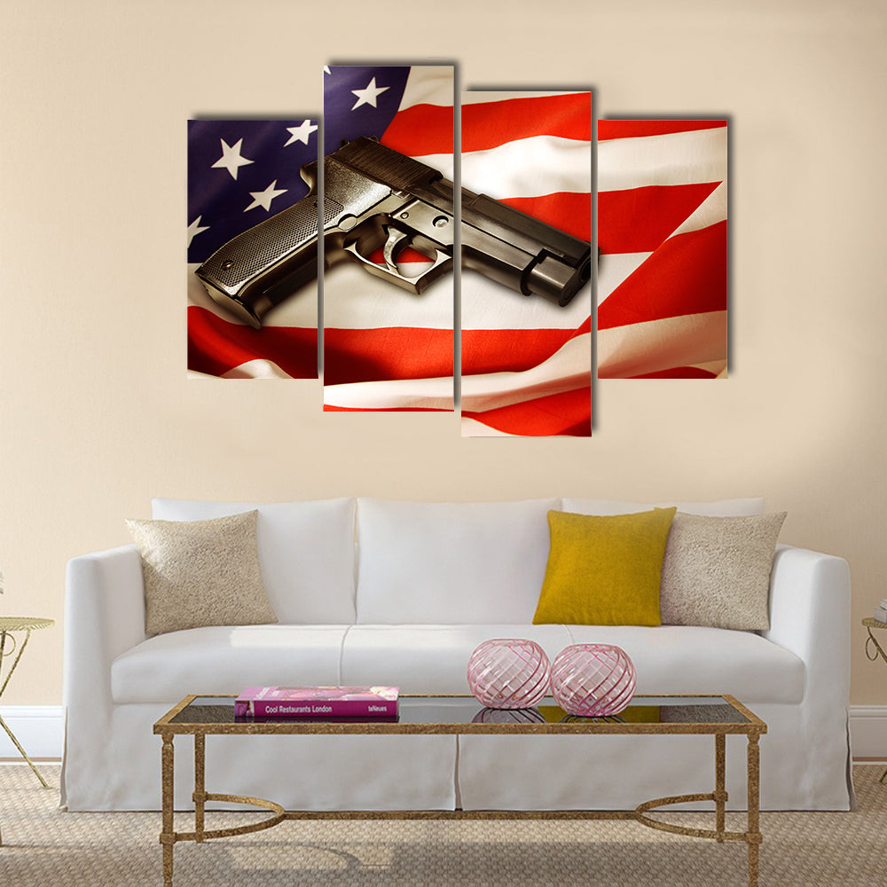 Handgun lying on American flag multi panel canvas wall art