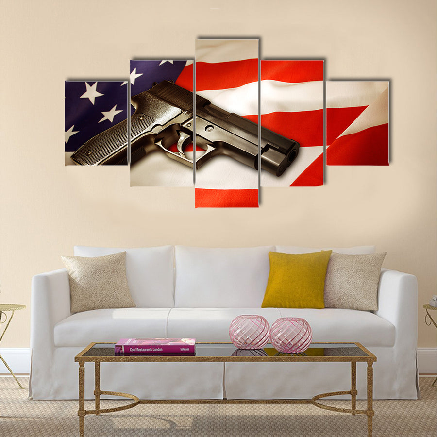Handgun lying on American flag multi panel canvas wall art