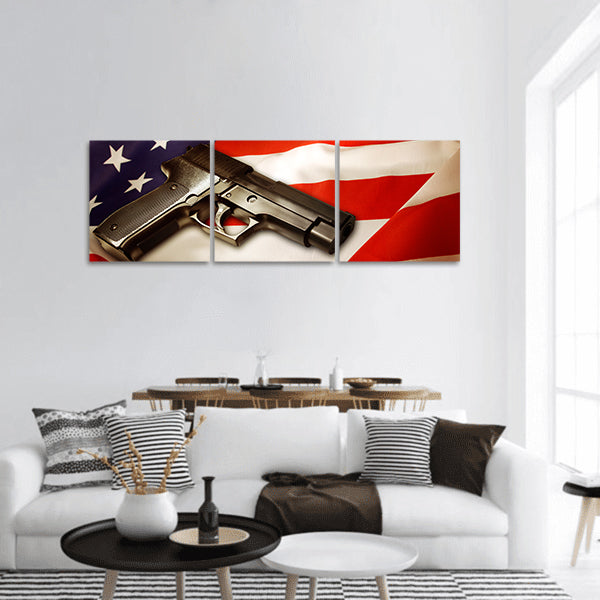 Handgun lying on American flag panoramic canvas wall art