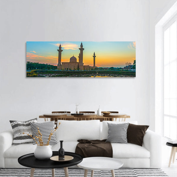Mosque and sunrise reflection on lake Panoramic Canvas Wall Art