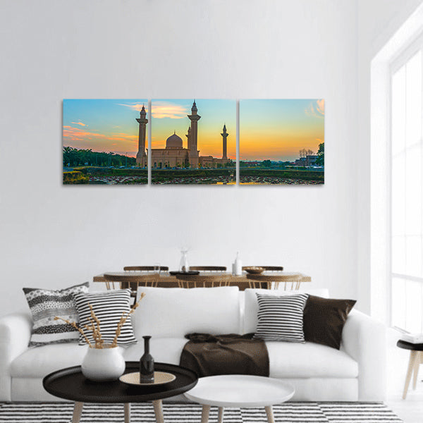 Mosque and sunrise reflection on lake Panoramic Canvas Wall Art