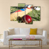 Cricket ball bat and gloves on the field Multi panel canvas Wall art