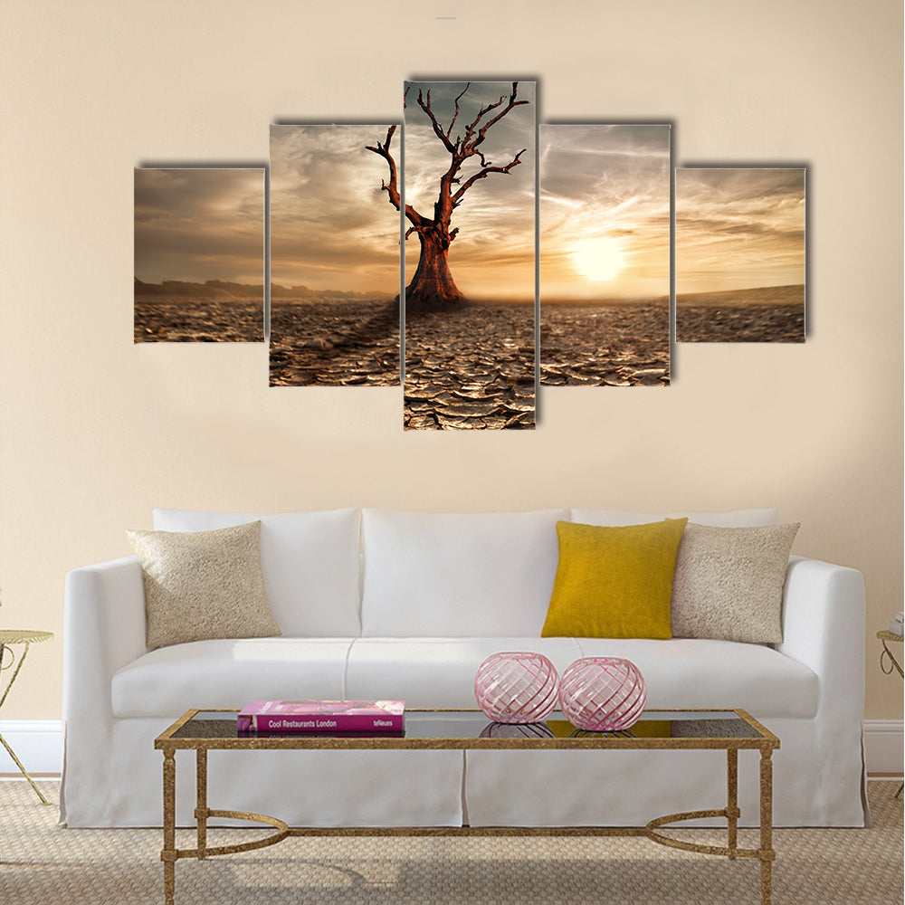 Lonely dead tree under dramatic evening sunset sky Multi panel canvas wall art