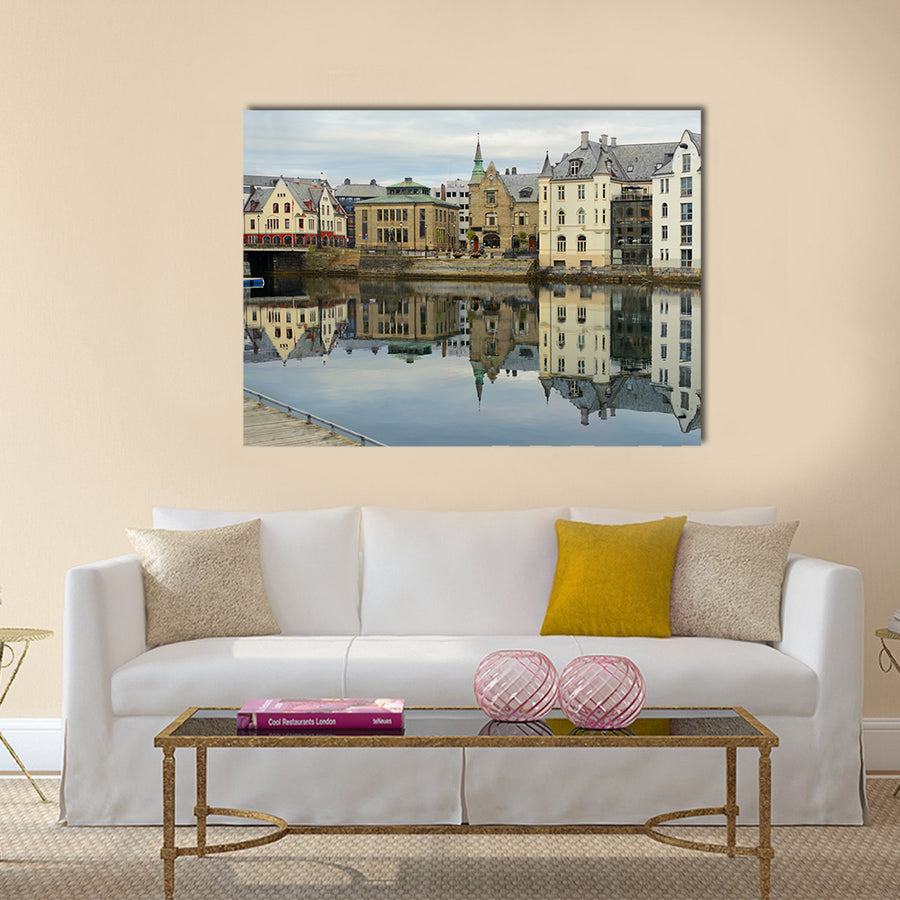 view on streets and houses at city of Alesund multi panel canvas wall art
