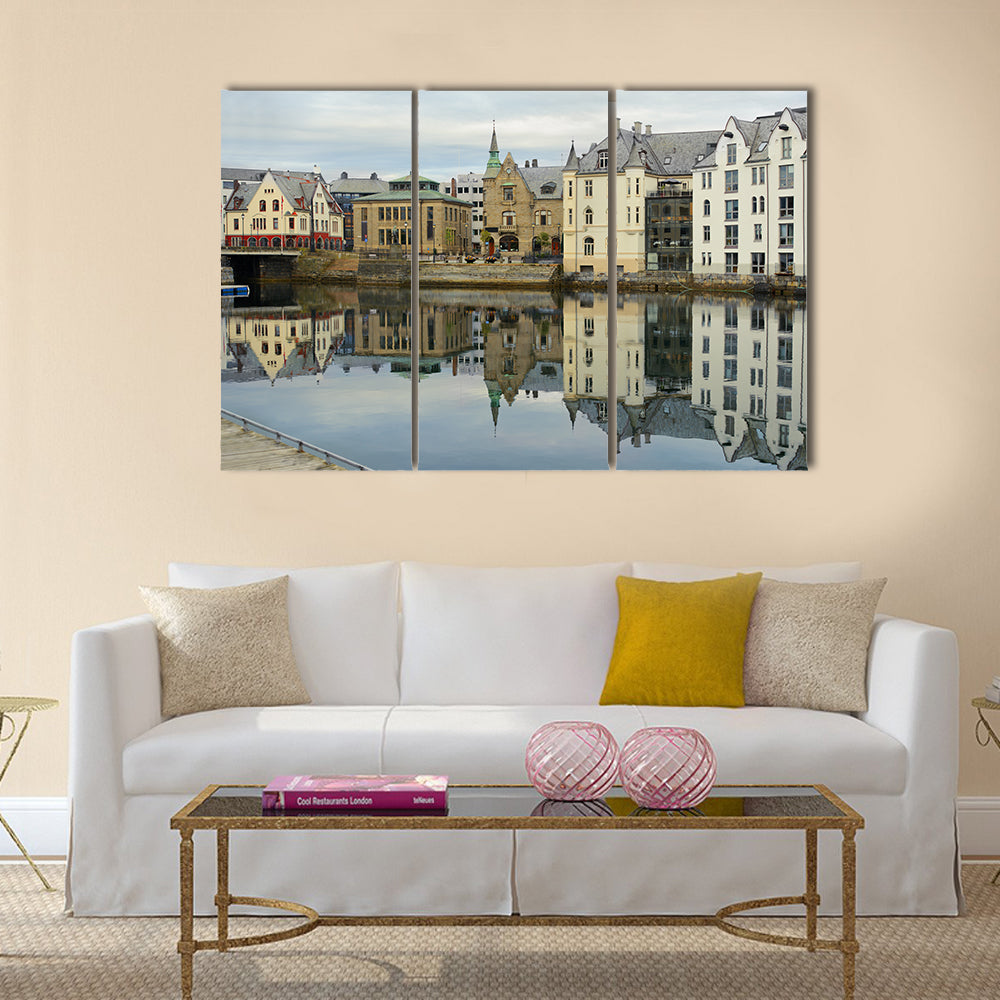 view on streets and houses at city of Alesund multi panel canvas wall art