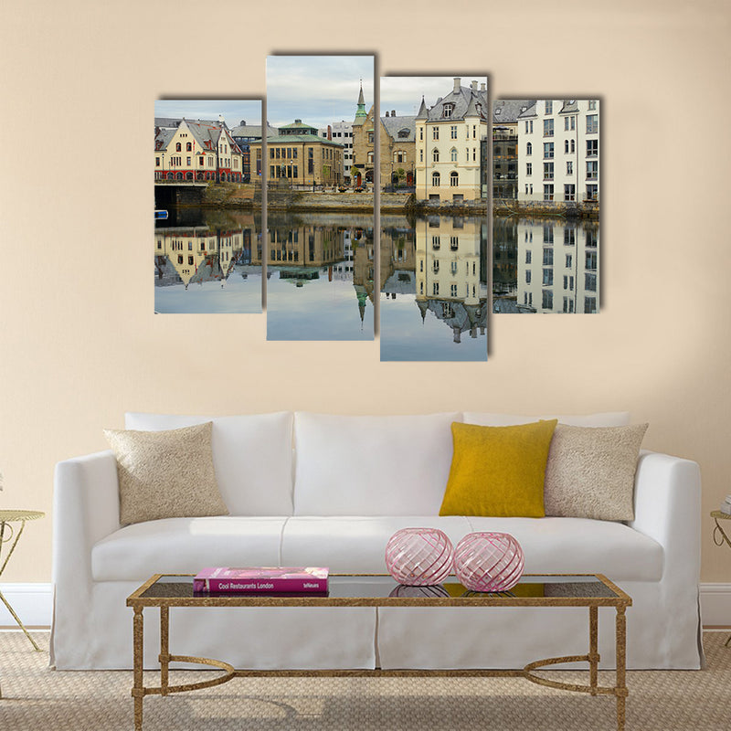 view on streets and houses at city of Alesund multi panel canvas wall art