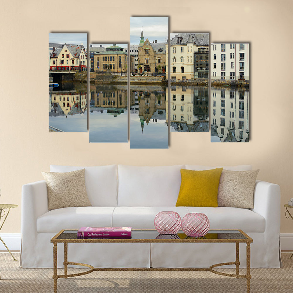 view on streets and houses at city of Alesund multi panel canvas wall art