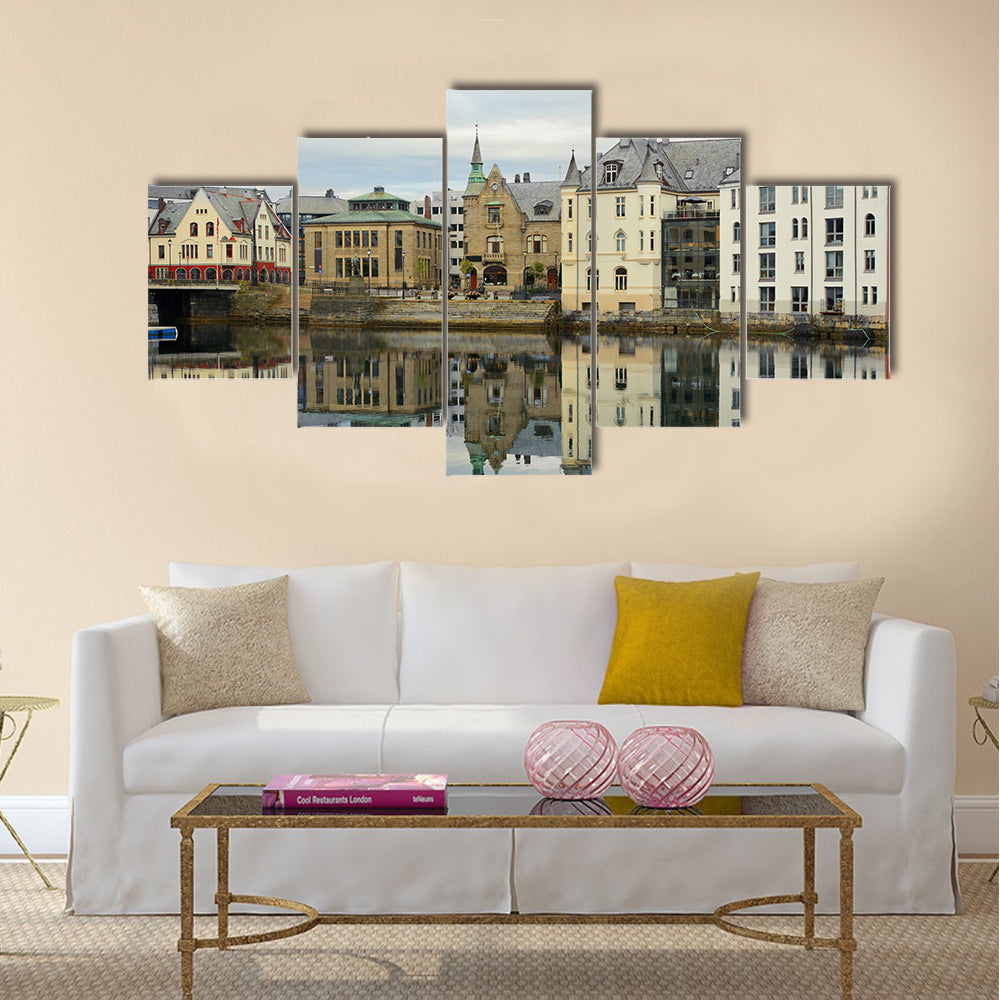 view on streets and houses at city of Alesund multi panel canvas wall art