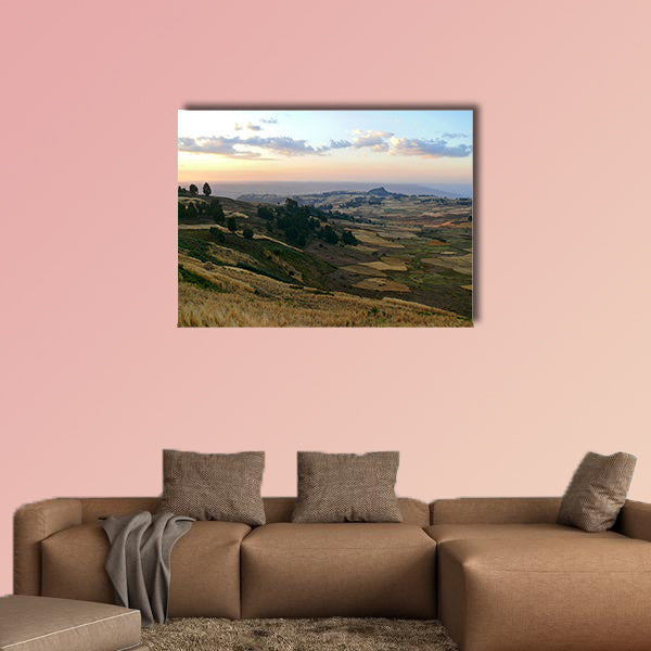 Mountain landscape. Cloudy sky illuminated by the sunset. Africa, wall art