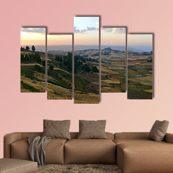 Mountain landscape. Cloudy sky illuminated by the sunset. Africa, wall art