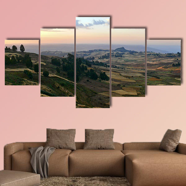 Mountain landscape. Cloudy sky illuminated by the sunset. Africa, wall art