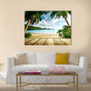 Seychelles beach and wooden pier Multi panel canvas wall art