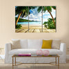 Seychelles beach and wooden pier Multi panel canvas wall art