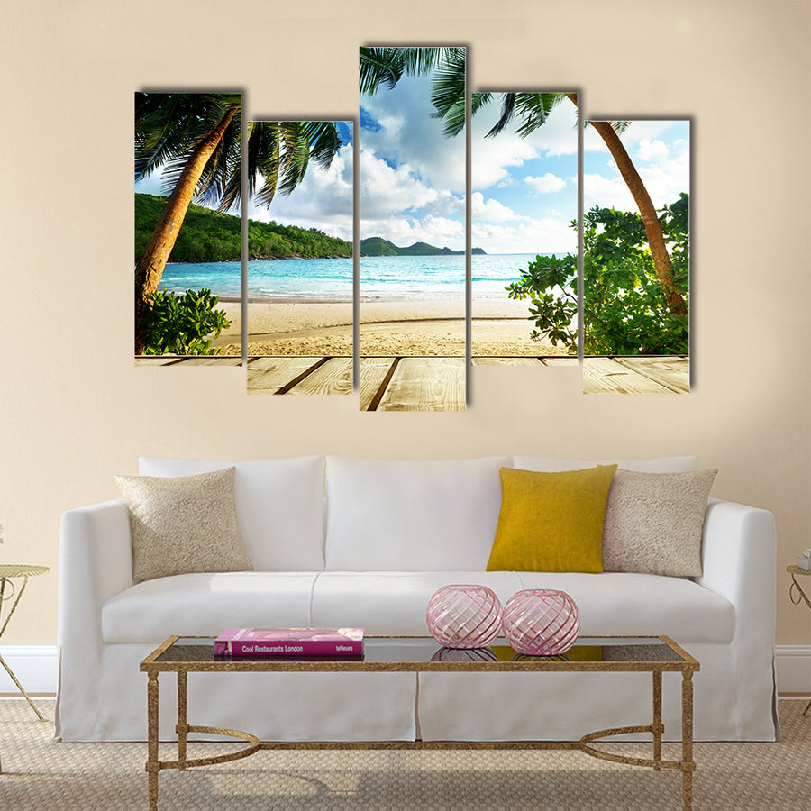 Seychelles beach and wooden pier Multi panel canvas wall art