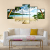 Seychelles beach and wooden pier Multi panel canvas wall art