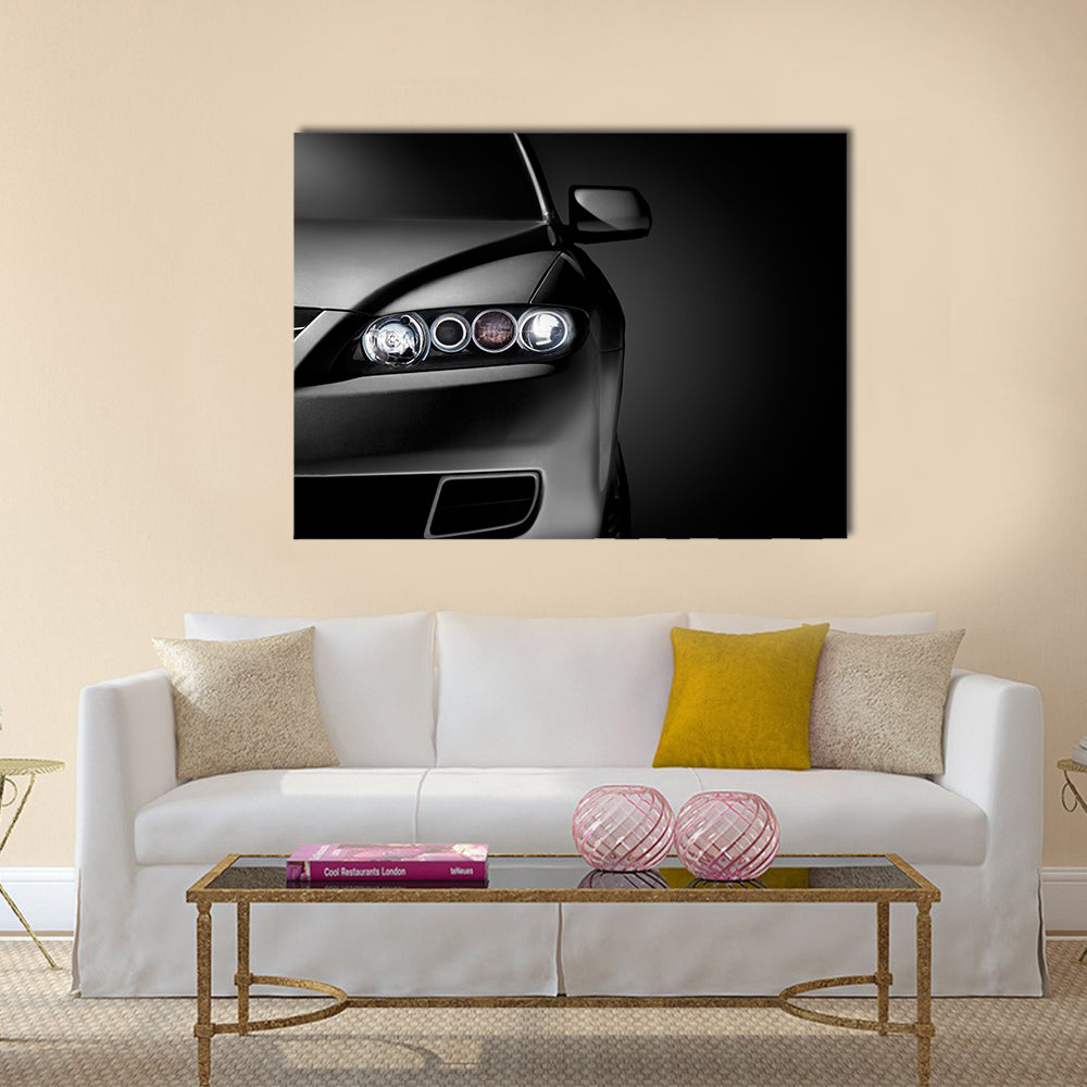 Gray modern car closeup on black background Multi panel canvas wall art