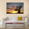 Three satellite dishes over sunset Multi panel canvas wall art