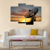 Three satellite dishes over sunset Multi panel canvas wall art