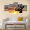 Three satellite dishes over sunset Multi panel canvas wall art