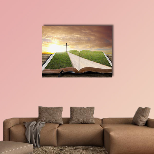 An open Bible with a road and grassy field leading to a cross multi panel canvas wall art