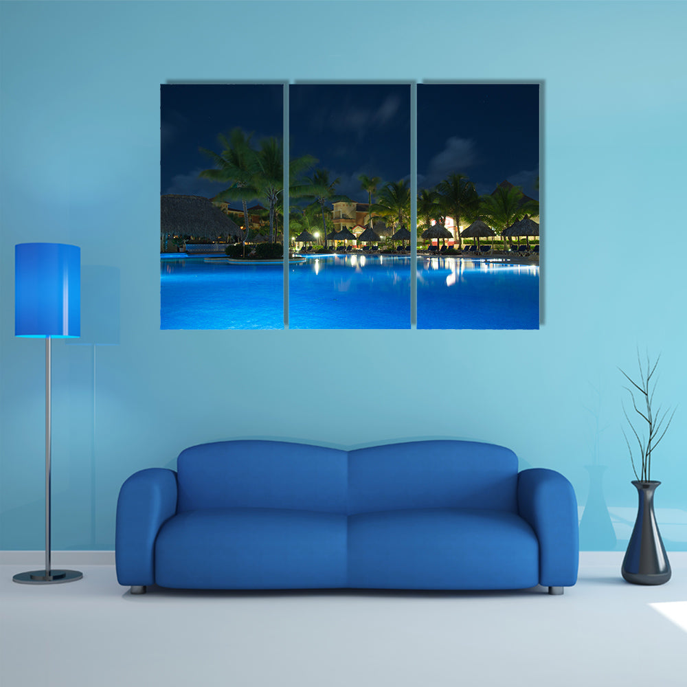 A most beautiful view of  Swimming pool in night illumination Multi Panel canvas wall art