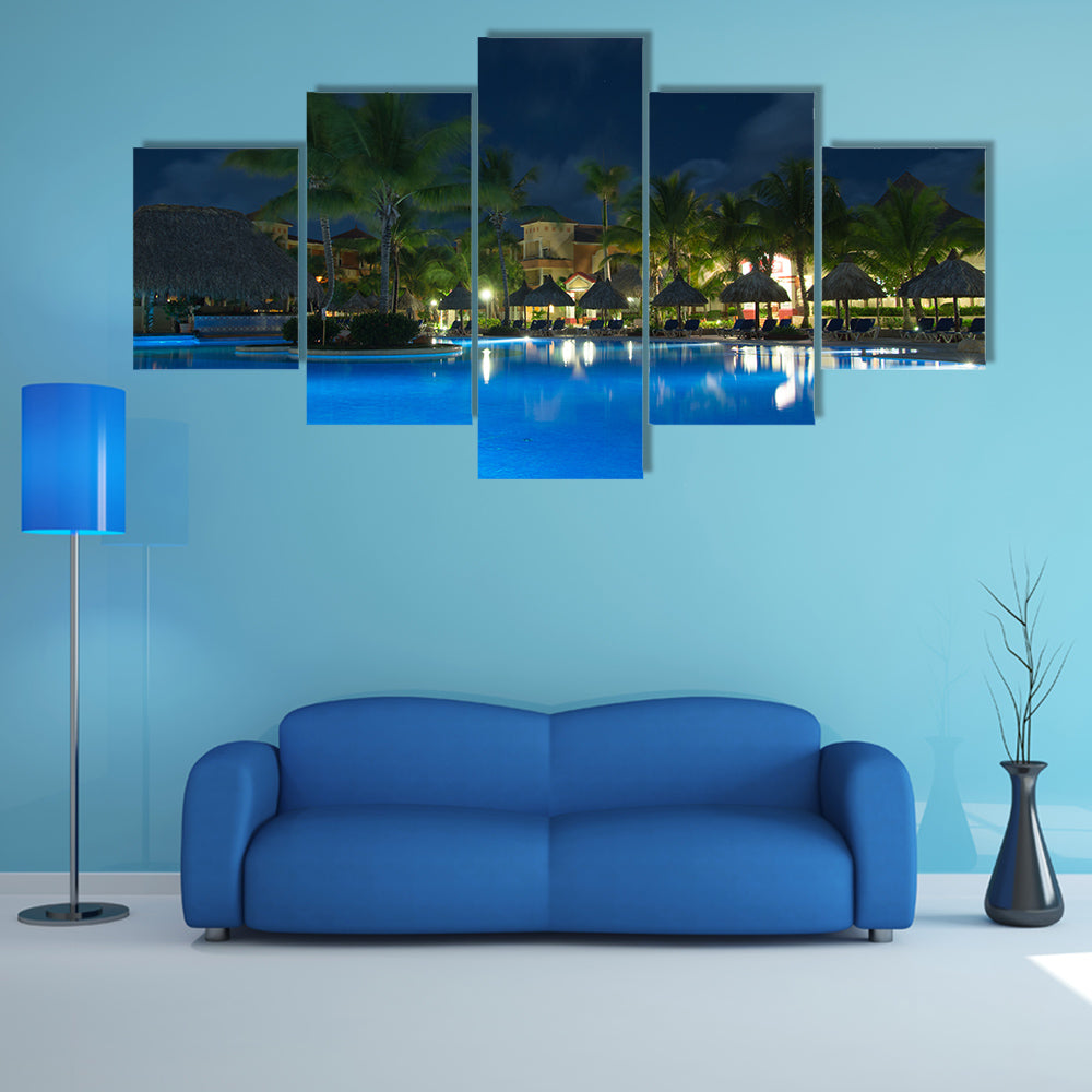 A most beautiful view of  Swimming pool in night illumination Multi Panel canvas wall art