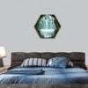 Fantastic cave and waterfall in the background hexagonal canvas wall art