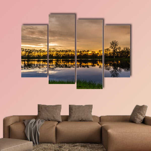 Beautiful sunset with a reflection over a small lake in Illinois Multi panel canvas wall art
