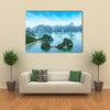 Tourist junks floating among limestone rocks at early morning in Southeast Asia Multi panel canvas wall art