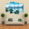 Tourist junks floating among limestone rocks at early morning in Southeast Asia Multi panel canvas wall art