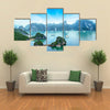 Tourist junks floating among limestone rocks at early morning in Southeast Asia Multi panel canvas wall art