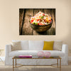 Heaped rustic bowl of savory quinoa with herbs, peppers and tomato Multi panel canvas wall art