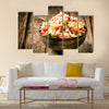 Heaped rustic bowl of savory quinoa with herbs, peppers and tomato Multi panel canvas wall art