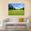 Golf course landscape viewed from the putting green Multi Panel Canvas Wall Art