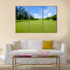 Golf course landscape viewed from the putting green Multi Panel Canvas Wall Art