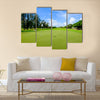 Golf course landscape viewed from the putting green Multi Panel Canvas Wall Art