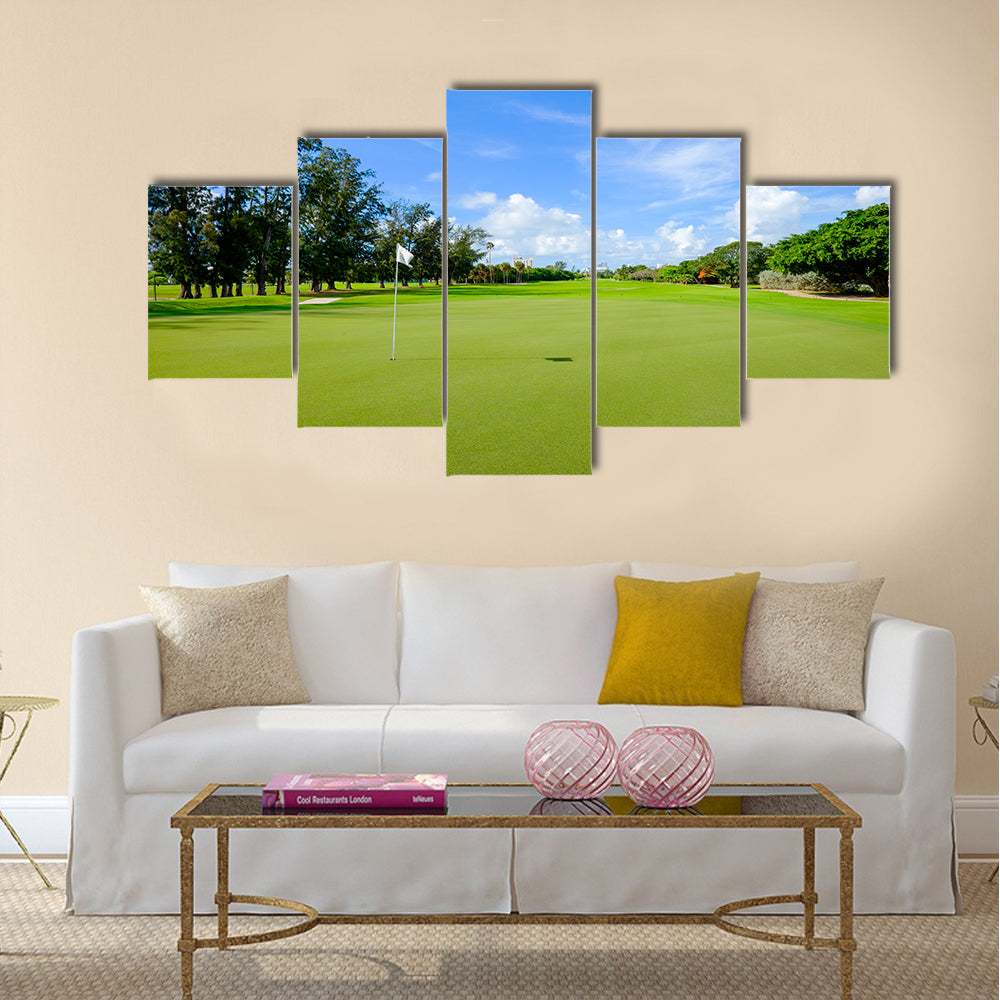 Golf course landscape viewed from the putting green Multi Panel Canvas Wall Art