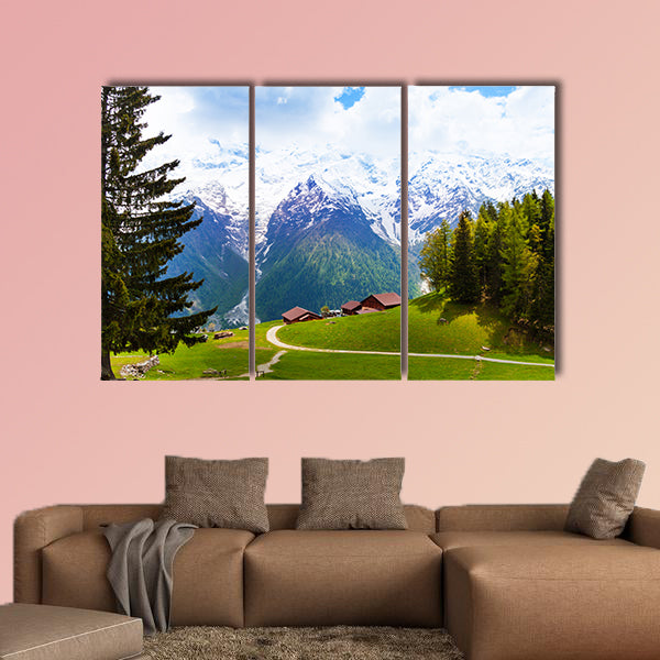 Picturesque landscape with houses and mountains view near multi panel canvas wall art