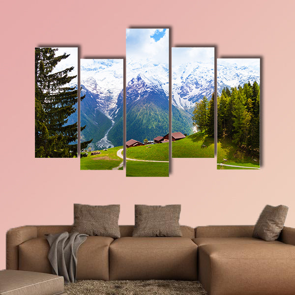 Picturesque landscape with houses and mountains view near multi panel canvas wall art