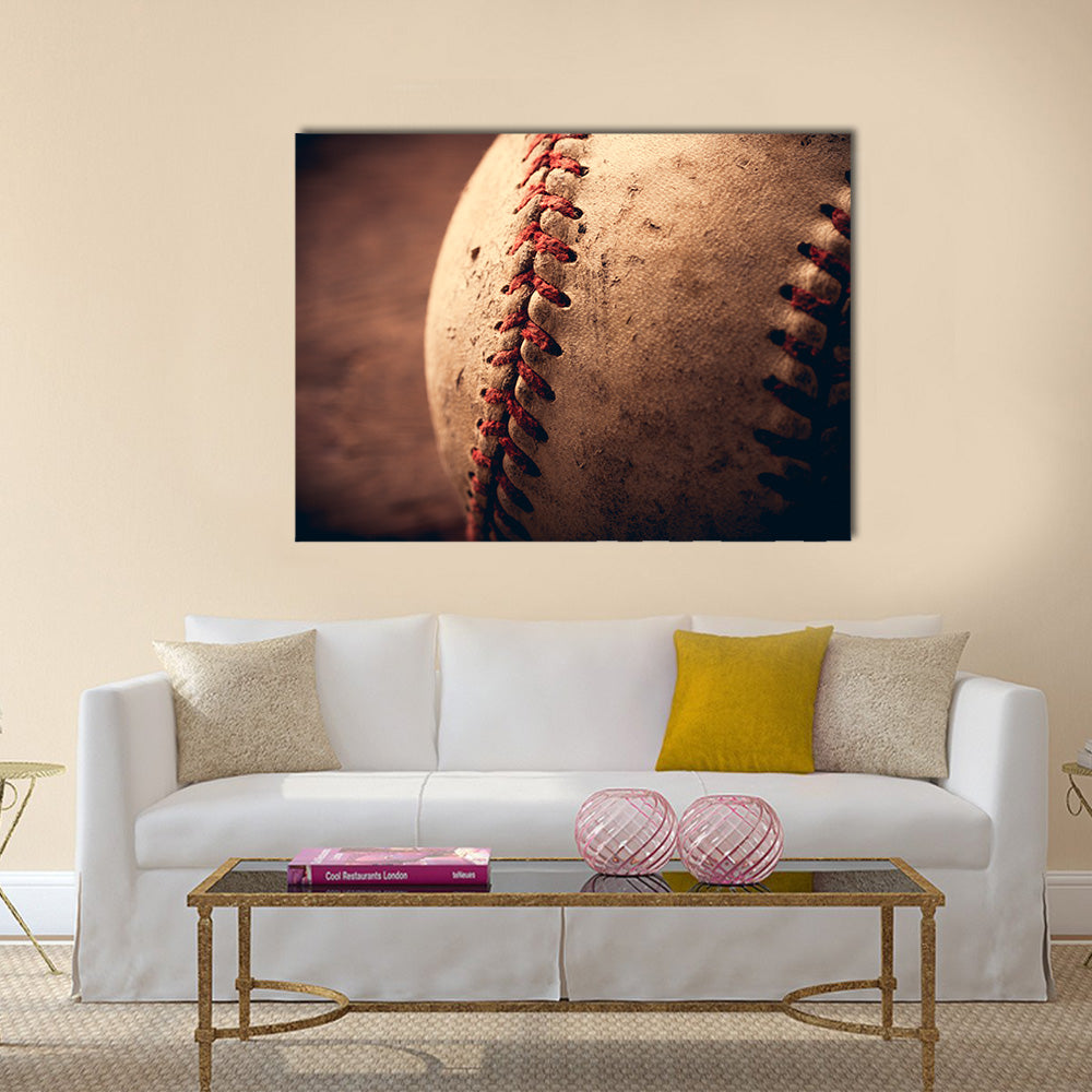 Old baseball on wooden background and highly closeup Multi panel canvas wall art